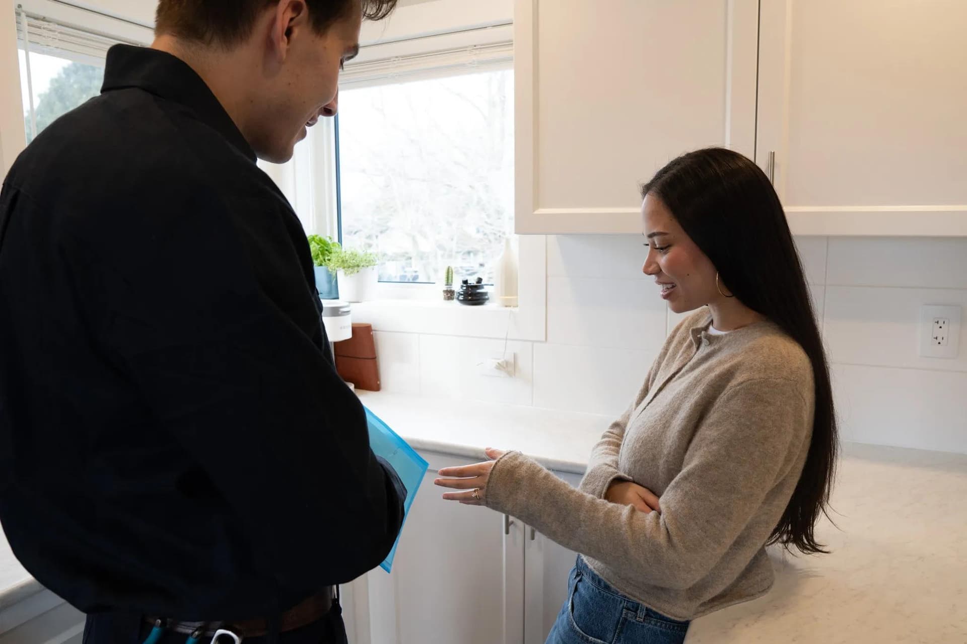 Plumber reviewing a detailed quote